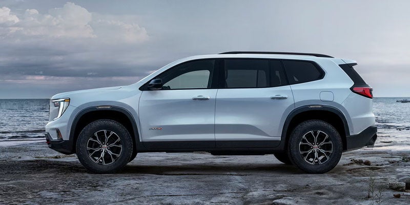 White GMC Acadia side profile